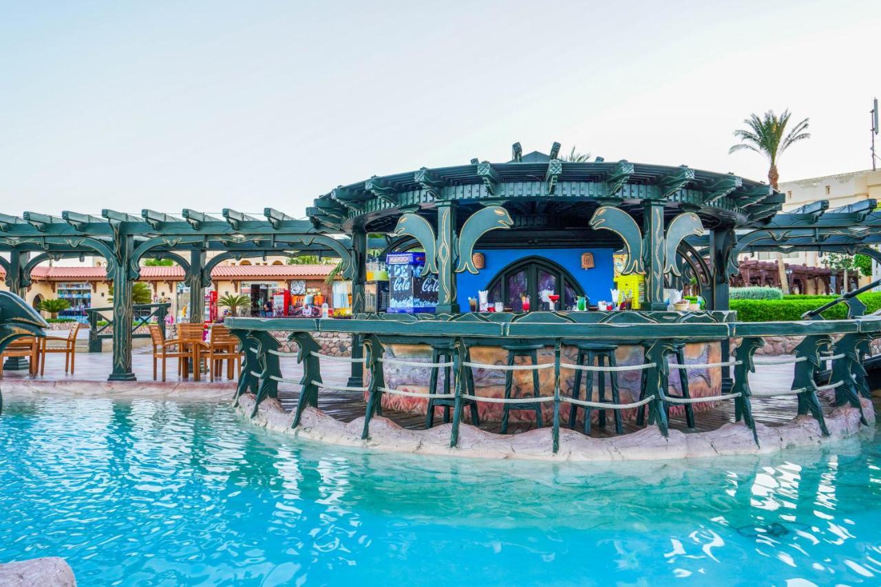 Charmillion Club Resort Sharm el-Sheikh Bagian luar foto The swimming pool at the hotel